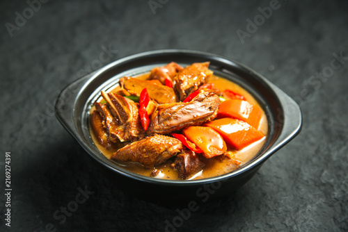 Roasted Goose Stew with Potatoes in Cast Iron Skillet - Traditional Farmhouse Cuisine