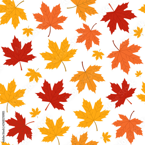 Colorful autumn leaves scattered on a white background create a vibrant seasonal pattern. Seamless pattern