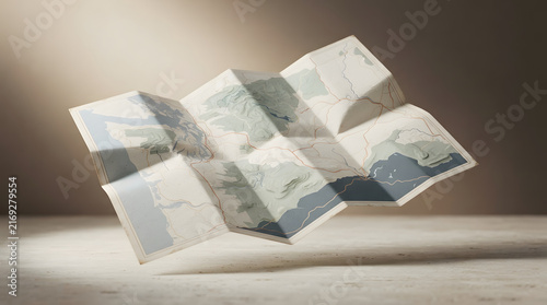 Abstract folded paper map showing topographic terrain elevation lines floating above smooth neutral concrete surface background.
