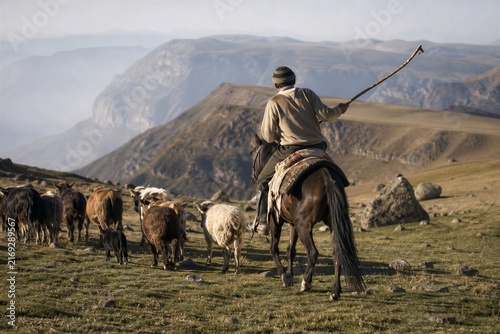 Male herder riding a horse and guiding a herd of goats across a highland plateau. Traditional pastoral life, mountain landscape, rural livelihood, and travel documentary concept.