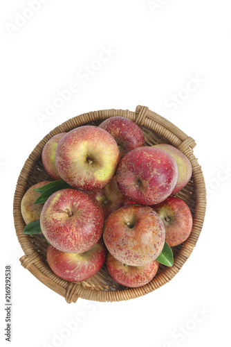 Foto Fresh Red Apples in Wicker Basket Isolated on White Background
