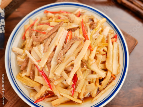 Obraz na plátně Stir-Fried Shredded Bamboo Shoots with Meat and Peppers - Traditional Chinese Di