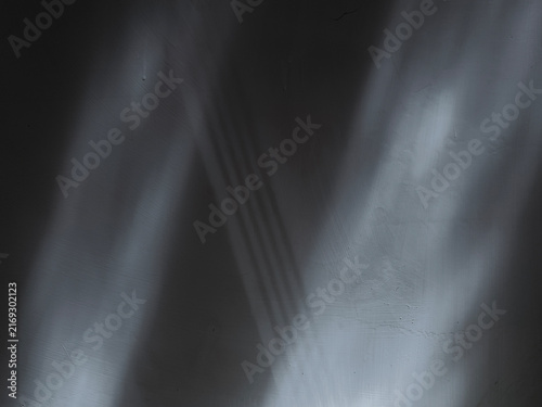 Light and shadow on white wall surface as grunge background.