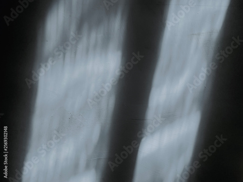 Wall background with sunlight. Natural sunlight with shadow wall.