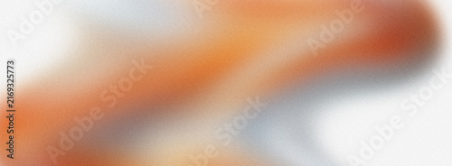 Abstract grainy gradient background with soft orange and grey blurred texture
