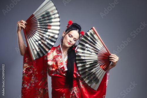 Elegant Mature Woman 40s as Japanese Kitsune in Red Kimono with Fans