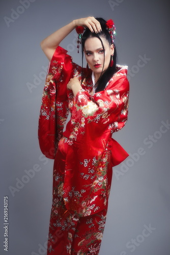 Elegant Mature Woman 40s in Traditional Red Japanese Kimono