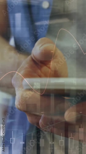 Animation of graph processing data over hands of caucasian man using smartphone