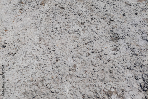 Foto A mixture of small gravel, sand, and dust