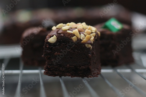 Foto Rich Chocolate Brownie with Nut Toppings on Cooling Rack