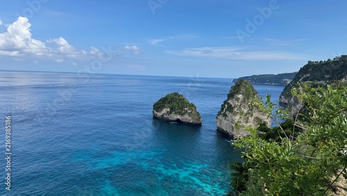 Tropical limestone cliffs and rock formations in turquoise ocean