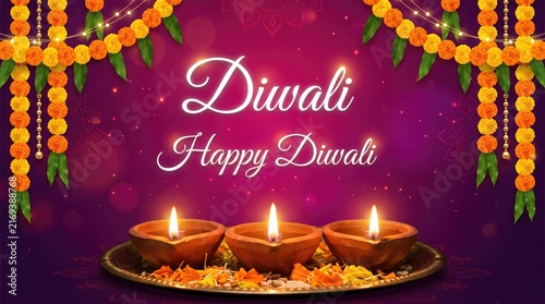 Beautiful festive background featuring glowing oil lamps and marigold flower garlands for the traditional indian celebration of diwali festival