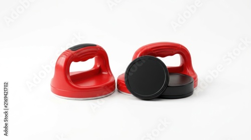 Red and black sports equipment on white background close up