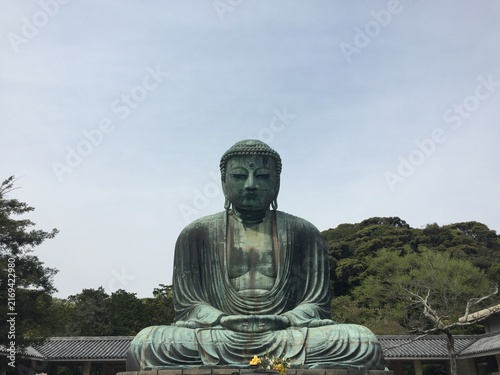 Fotografie Great Buddha statue of Kamakura (Kotoku-in temple) under clear sky in Japan