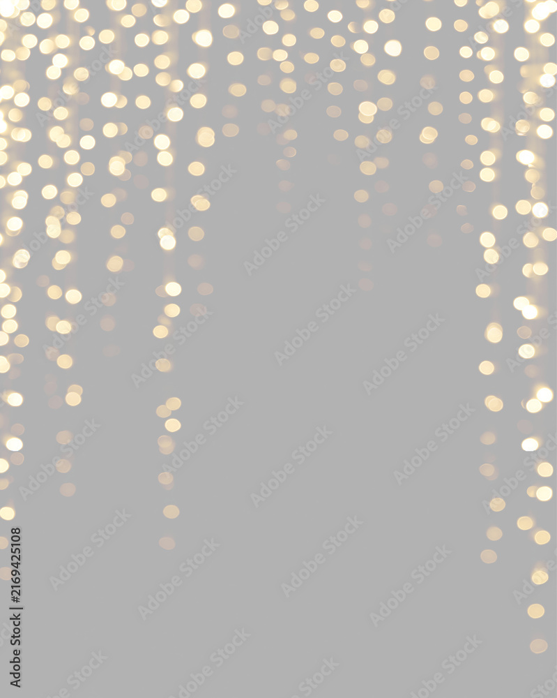 Obraz premium Vertical overlay of cascading golden bokeh lights Garland on transparent background