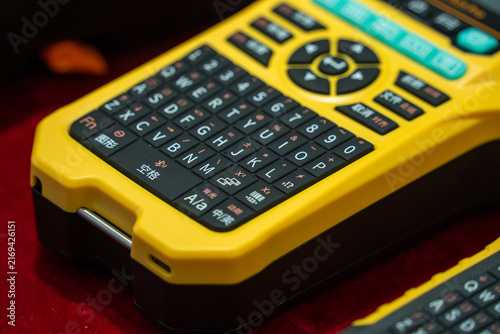 Foto Handheld Electronic Device with QWERTY Keyboard and Control Pad