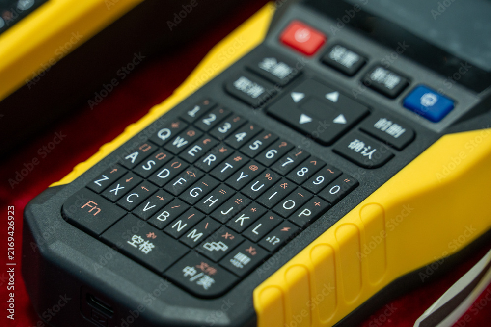 Konstfotografi Handheld Electronic Device with QWERTY Keypad and Function Buttons