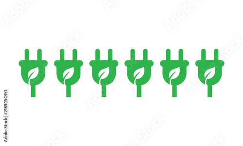 Green electrical plugs with leaf shapes symbolizing eco-friendly energy solutions isolated on white background
