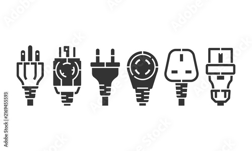 Various electrical power plugs in a row against a white background symbolizing global connectivity and technology