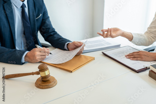 Male lawyer and professional businesswoman working and discussio