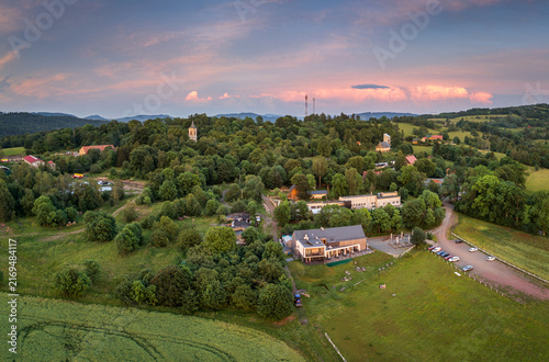 Bild auf Leinwand Miedzianka village and Rudawy Janowickie at sunset, Poland