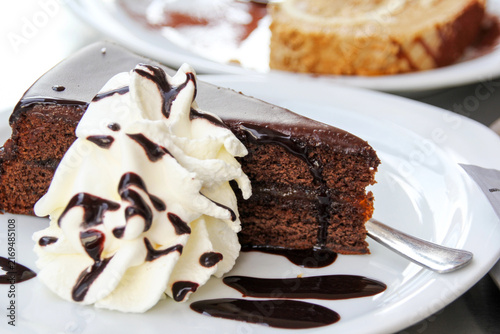 Photography Austrian sweets specialty: Sacher Cake with decorative cream