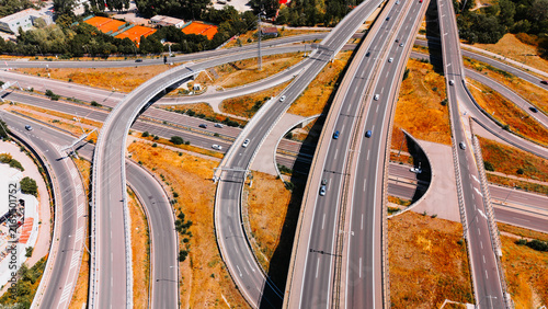 Photography Traffic moving along a busy highway with many curves and exits in daytime