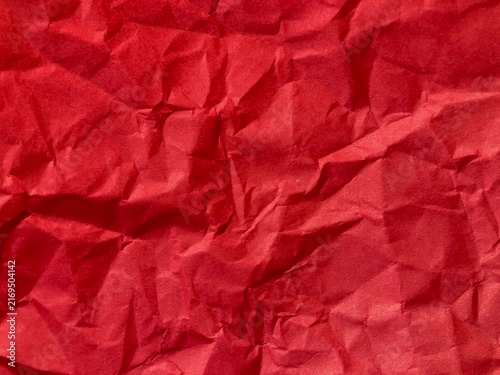 Red Crumpled Paper Texture, Deep Scarlet Wrinkled Sheet with Strong Folds and Rough Creases, Rich Paper Background for Posters, Packaging, Scrapbook, Craft and Print Projects