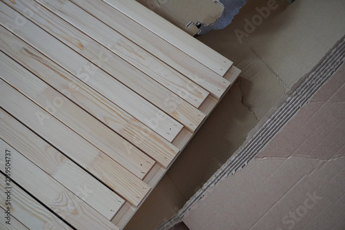 Assembling a children's bed. Furniture parts. New furniture unpacking. Assembling furniture at home. DIY concept with detailed view of furniture installation process.
