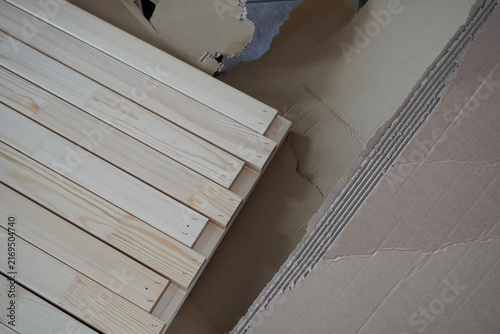 Assembling a children's bed. Furniture parts. New furniture unpacking. Assembling furniture at home. DIY concept with detailed view of furniture installation process.
