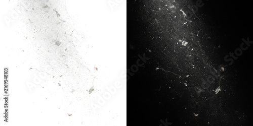 Detailed view of floating dust, fibers, and tiny debris creating an abstract, grunge texture against contrasting light and dark