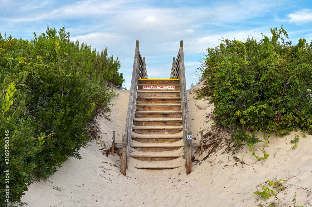 Fototapeta premium Steps Leading to a Beach in Corolla North Carolina With Clear Sky