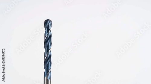 Industrial metal drill bit featuring sharp spiral flutes and dark cobalt coating isolated against a clean white studio light background