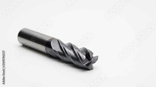 Industrial carbide end mill cutter featuring sharp helical flutes for precision metal machining applications in modern manufacturing workshops and factories
