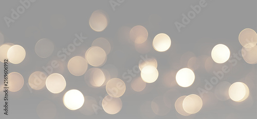 фотографія Soft golden bokeh lights with warm blurred circles, glowing highlights and elega