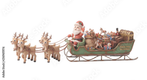 Canvas Print Santa Claus riding sleigh pulled by reindeer with gifts