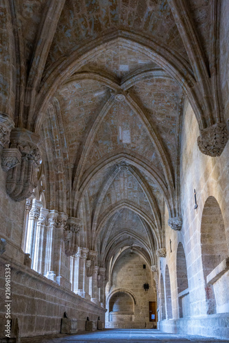 A historic stone cloistered hallway