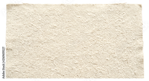 Soft cream textured floor rug piece with subtle pattern and frayed edges