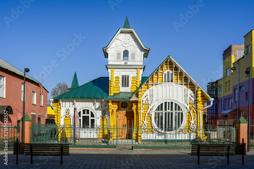 Yellow wooden mansion of the Luzhin merchants in Kimry town, Tver region of Russia