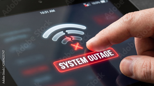 System outage warning on digital tablet. Red error notification with disconnected wifi symbol on touch screen. Internet connection failure issue.