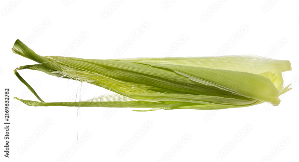 Naklejka premium Fresh stringy corn, maize silk pile and with green leaves isolated on white background, clipping path 