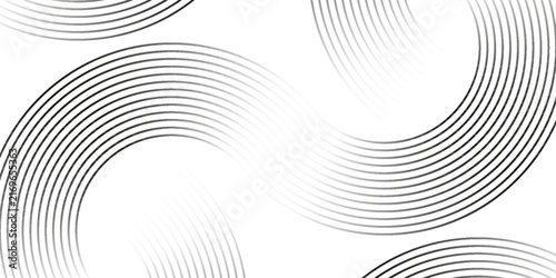 Abstract gold circle lines on dark background.