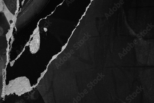 Old ripped torn blank dark black and white fly posters textures backgrounds grunge creased crumpled paper vintage collage placards empty space for text