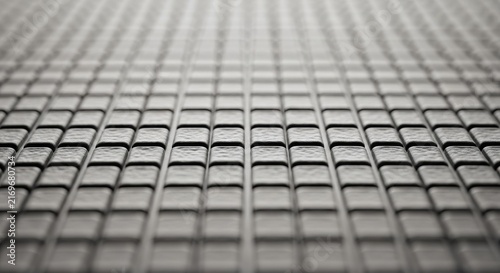 Textured Background with Small Square Patterns and Soft Lighting Effects