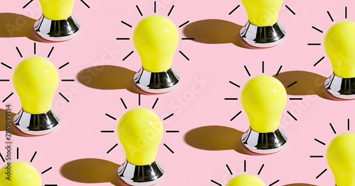 Yellow light bulb pattern with shadow