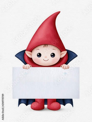 Cute child in red vampire costume holding blank white sign with happy expression on textured background
