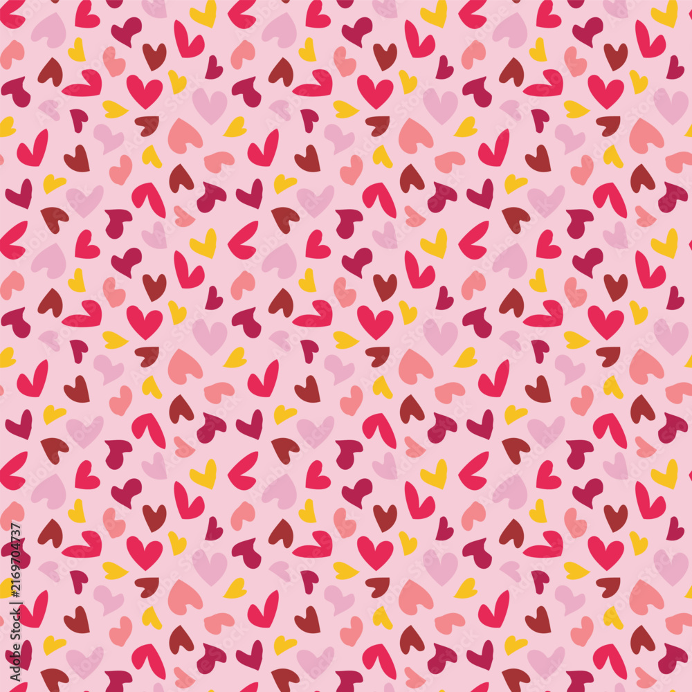 Fototapeta premium Seamless vector pattern with small red and yellow hearts on pink background