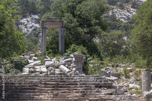 The ruins of Termessos. An ancient megalithic structure in Turkey. Ancient buildings of previous civilizations. Arches made of megalithic stone blocks.