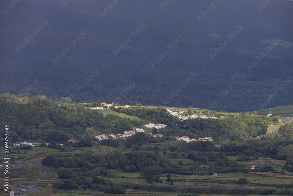 Obraz premium Terceira island rural village resting on green hills