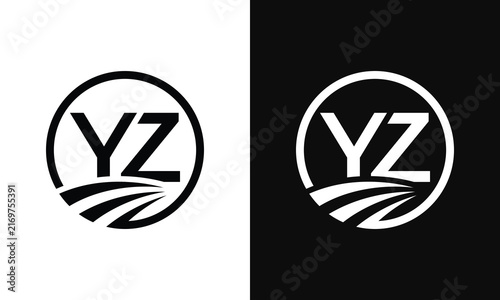 Clean YZ monogram inside a circular frame with flowing accents, suitable for professional company branding and modern identity design.